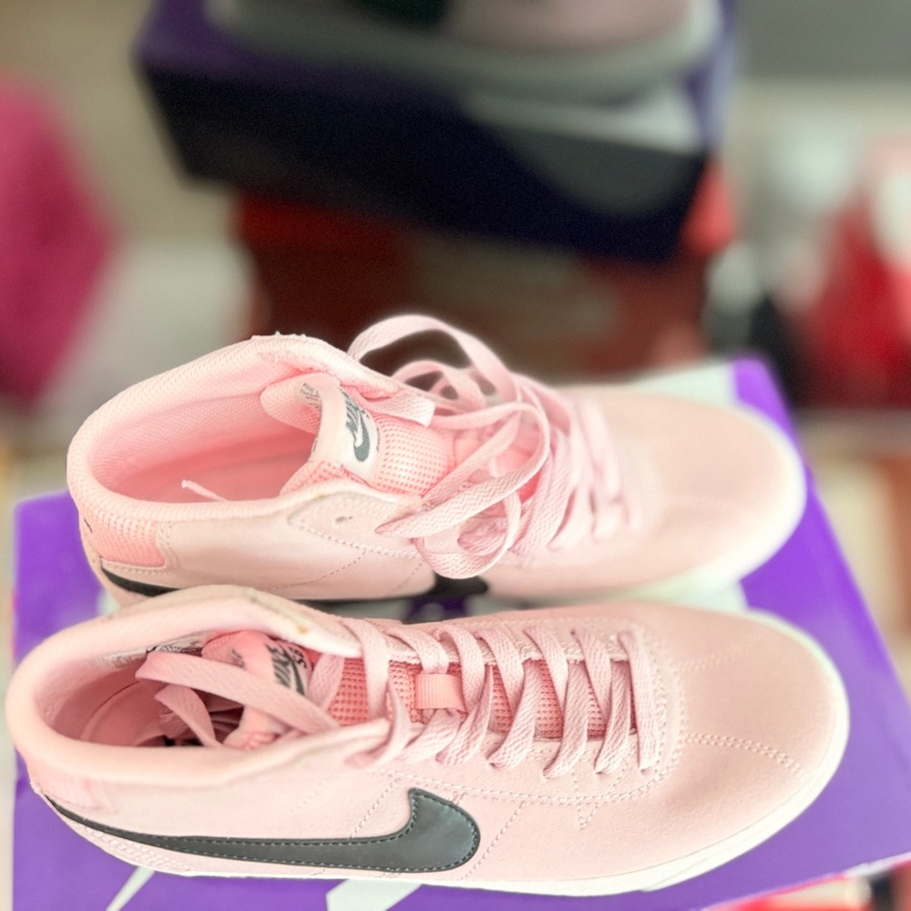 Pink Sneakers with Black Swoosh